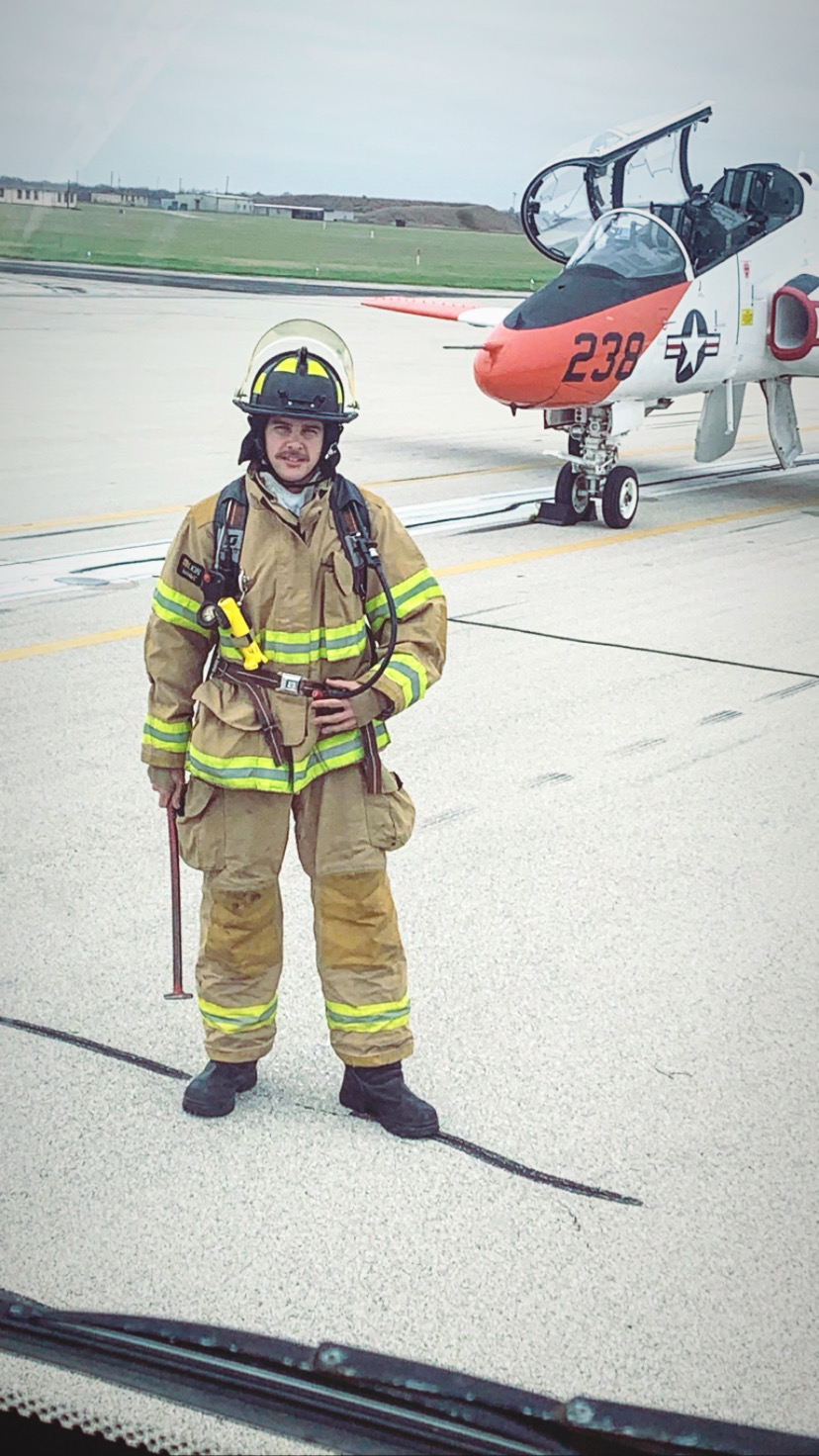 Joshua Diskin in firefighter gear